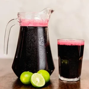 This refreshing beverage is crafted from purple corn, a variety of fruits, and aromatic spices, creating a unique and flavorful concoction.