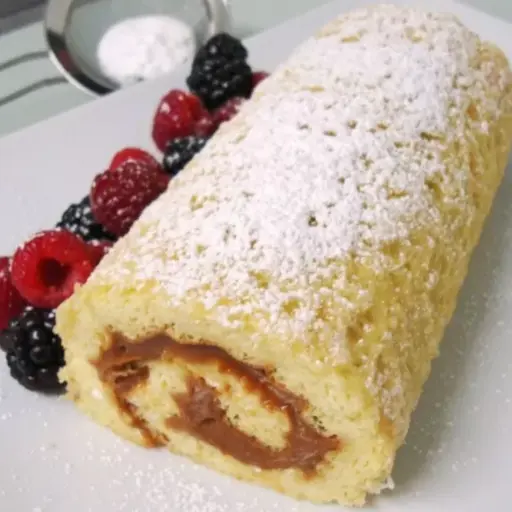 A delicate Peruvian cake roll filled with dulce de leche. The perfect finale for any celebration.
