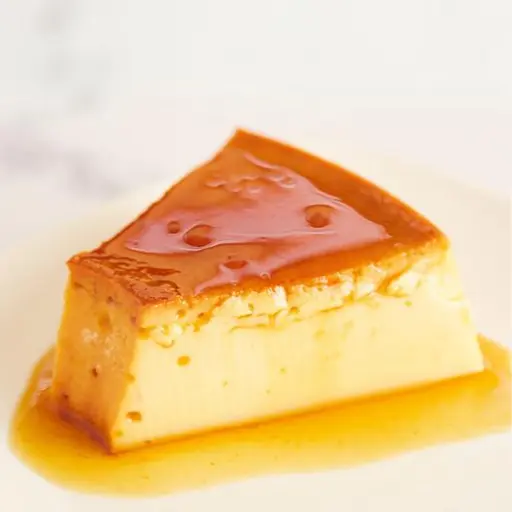 A traditional Peruvian dessert featuring a creamy custard with a touch of caramelization